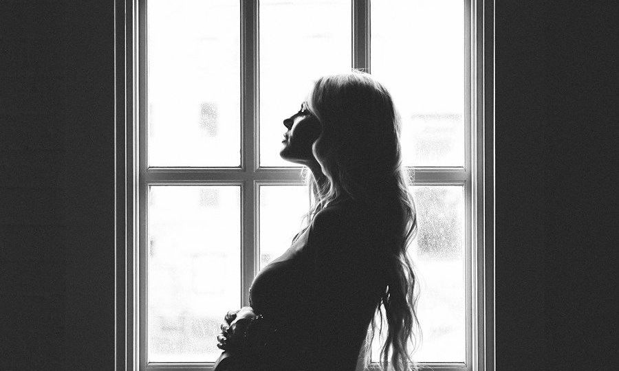 maternity photoshoot window light
